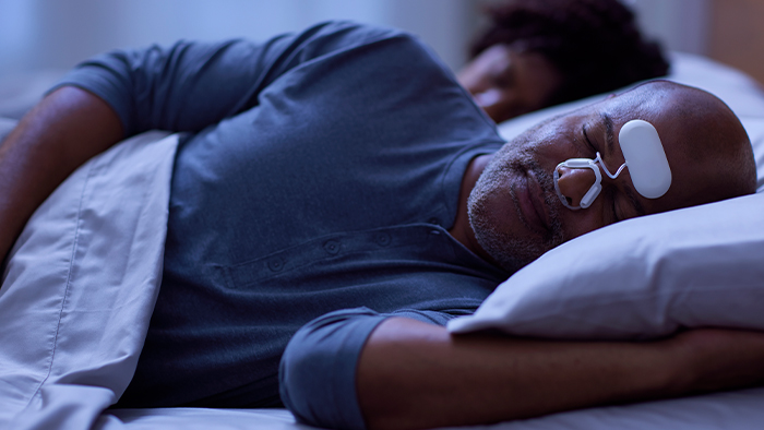 Man with respiratory device
