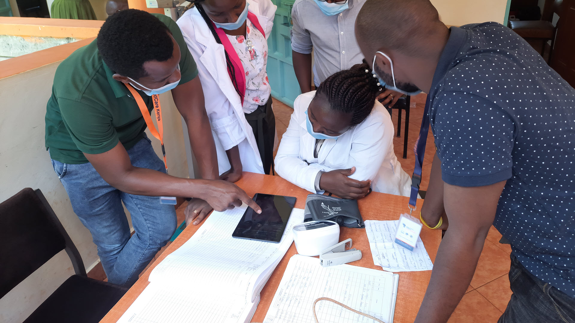 Local healthcare workers working with AfyaPro software